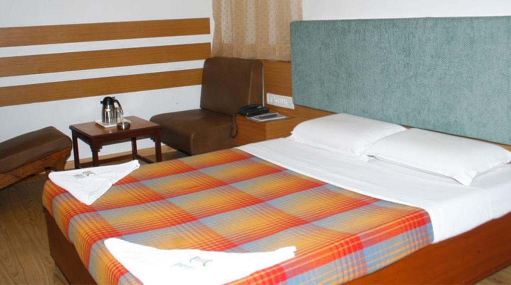 Hotel Kanishka Phg Bengaluru Szoba fotó